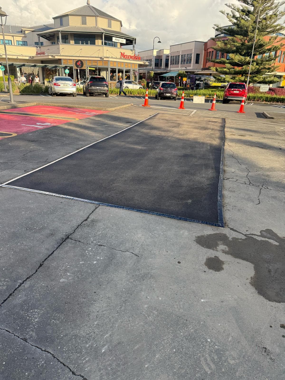 Asphalt car park patching and repair at a commercial property in Auckland - Bromley Group