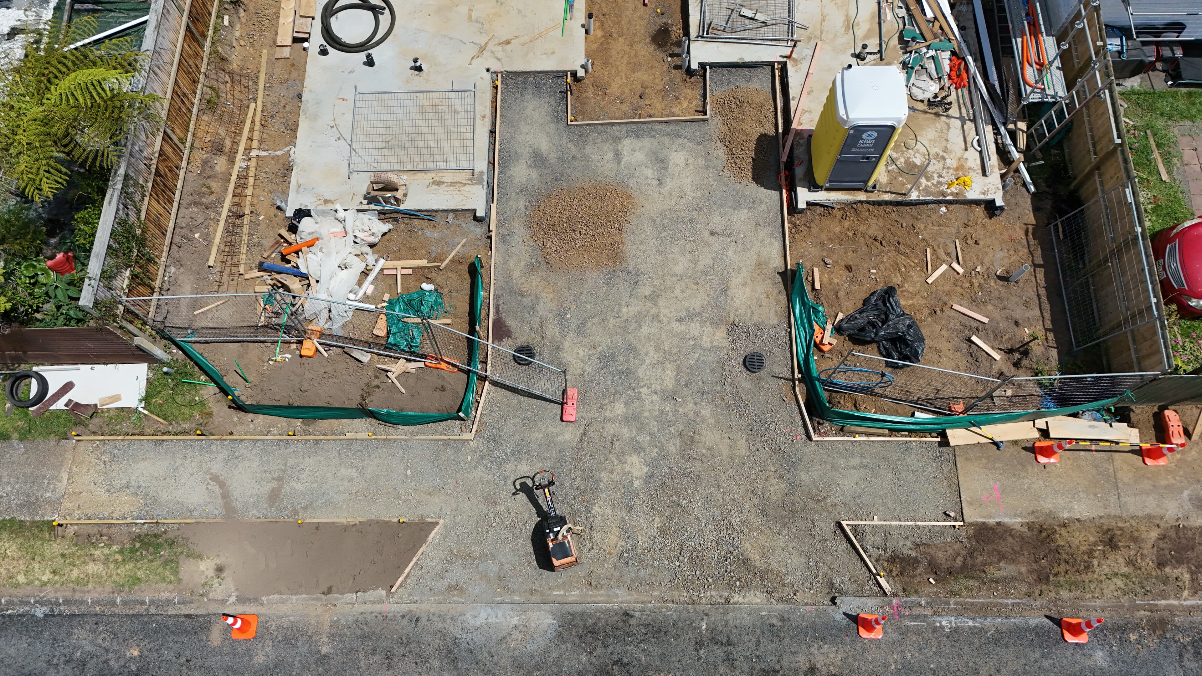 Aerial view of concrete kerb, paths, and flatwork on a residential subdivision in Auckland - Bromley Group