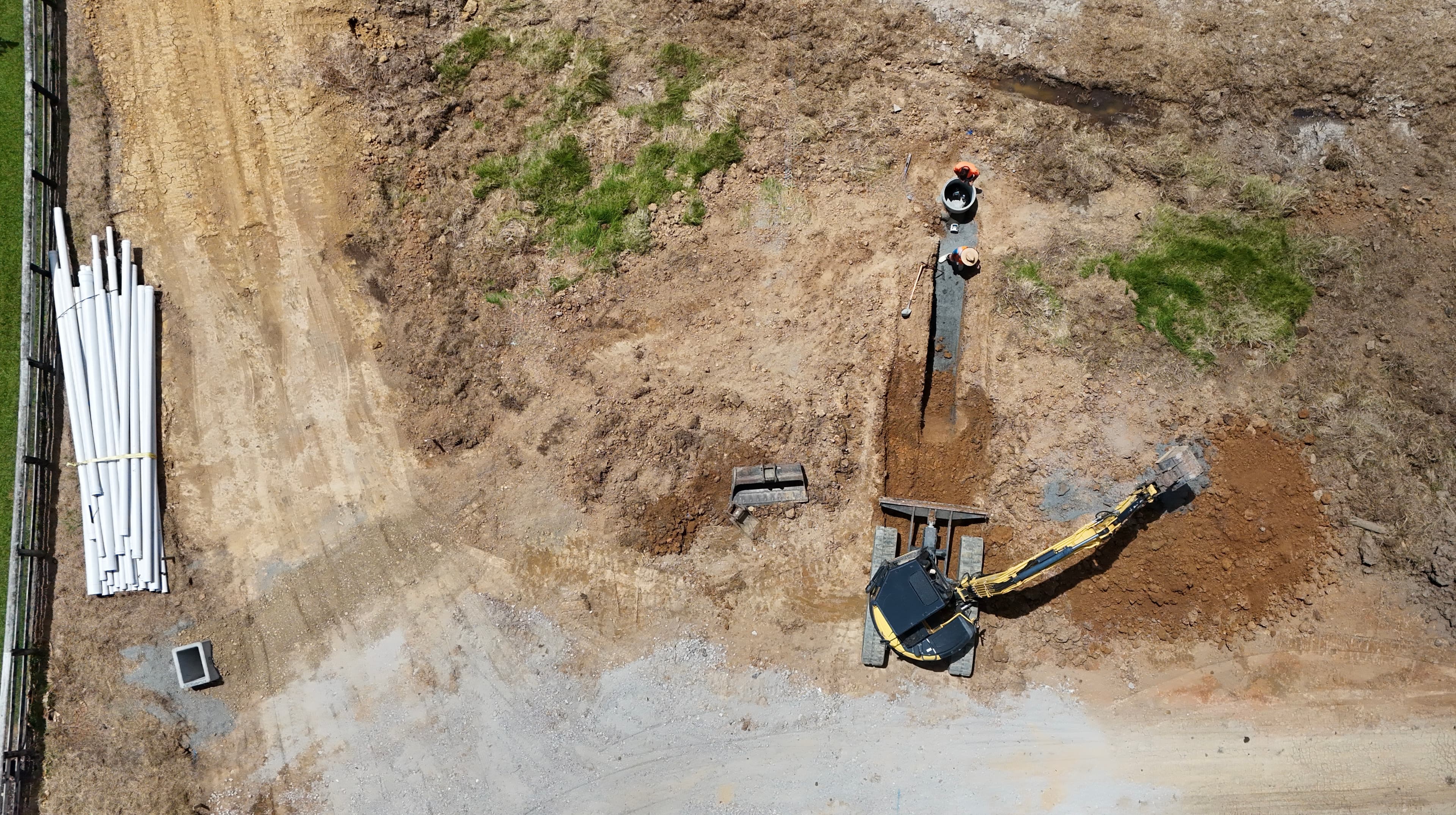 Aerial view of drainage excavation and pipe laying on a construction site in Auckland - Bromley Group