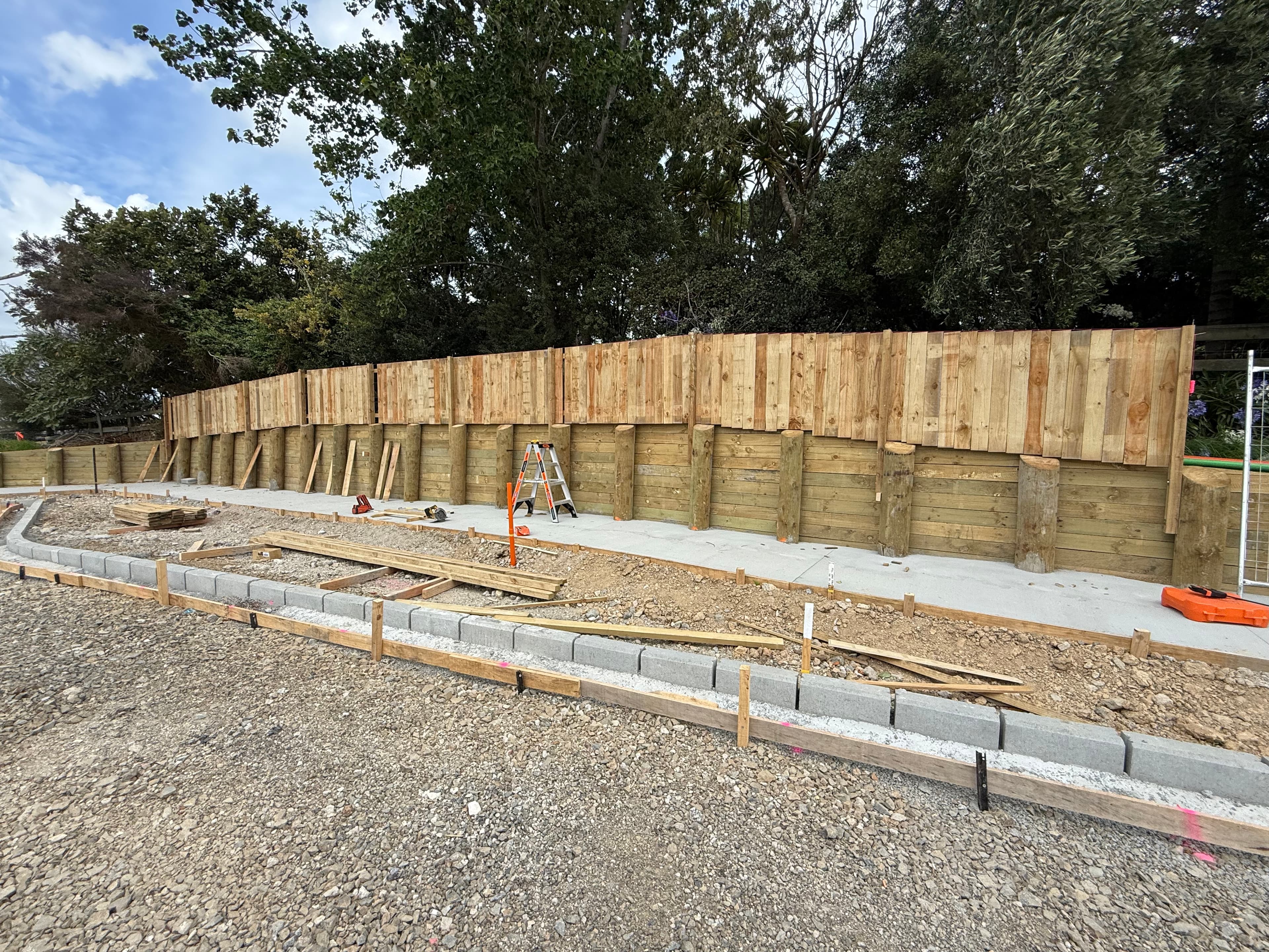 Large timber retaining wall under construction in Auckland - Bromley Group
