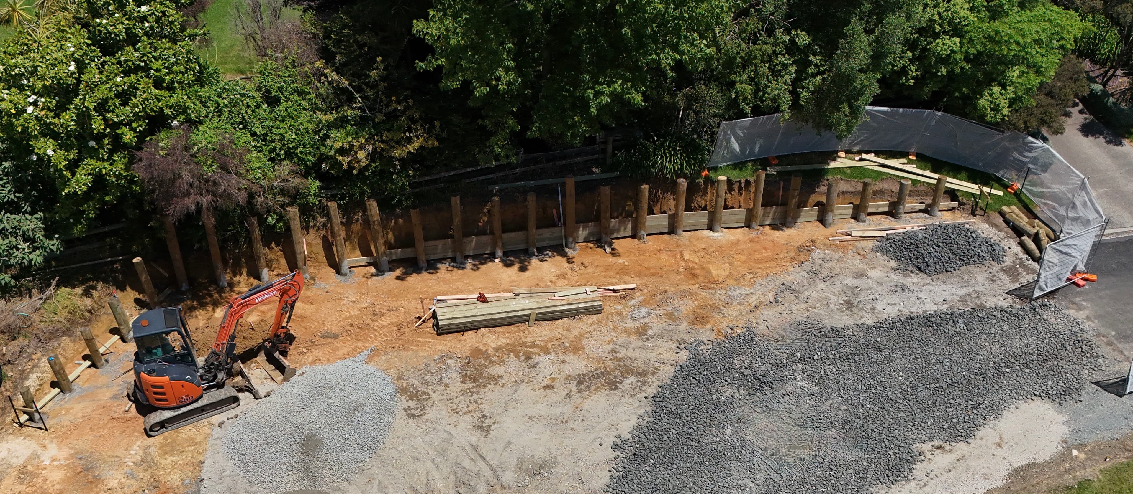 Aerial view of timber retaining wall construction in Auckland - Bromley Group